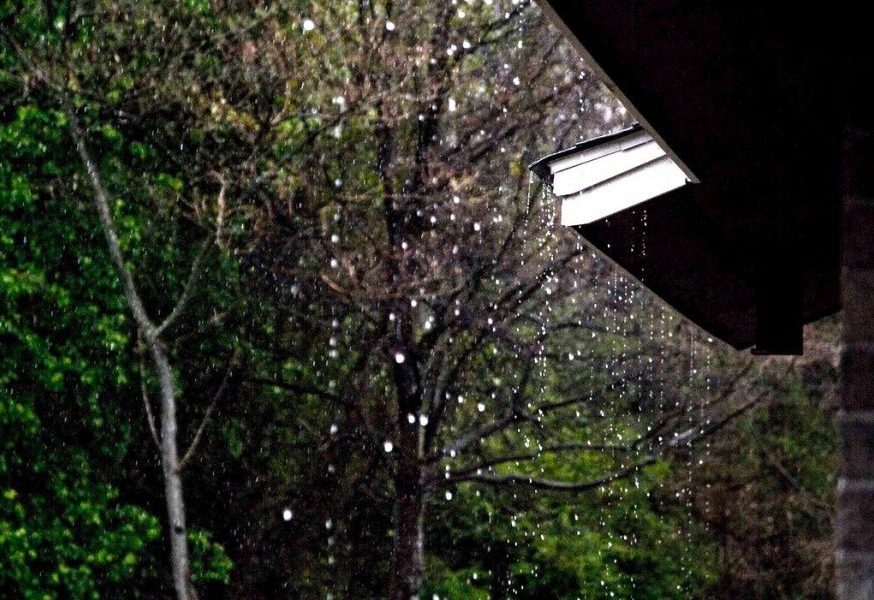 Rain damage. The Roofs are Shining from the Rain.